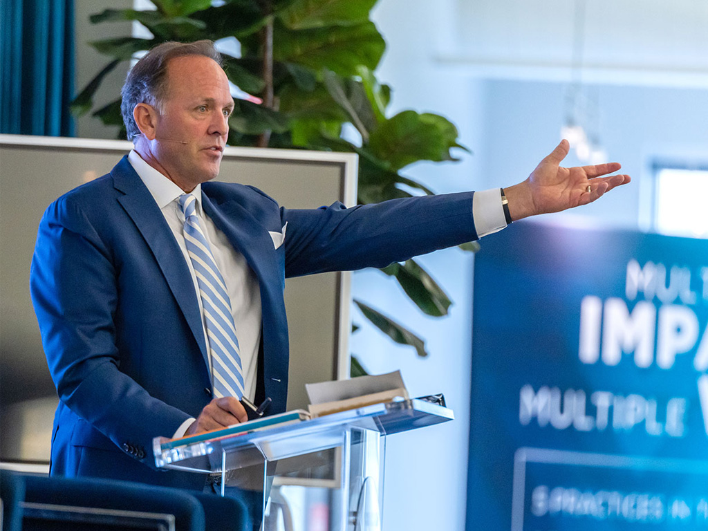 jay-speaking-blue-suit